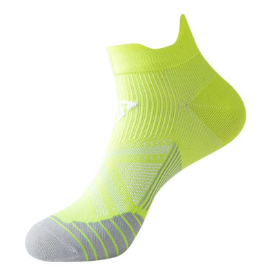 Breathable neon yellow sports socks for men and women, ideal for running, fitness, and marathon activities.