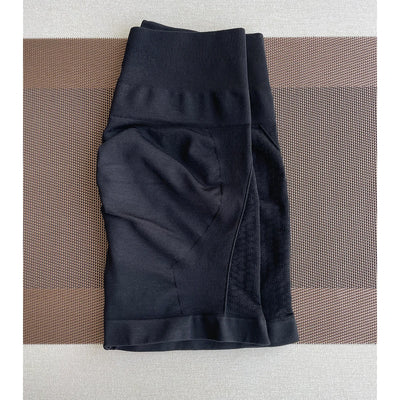 Amplify Contour Shorts for women in black, perfect for yoga and fitness workouts, seamless design and comfortable fit.