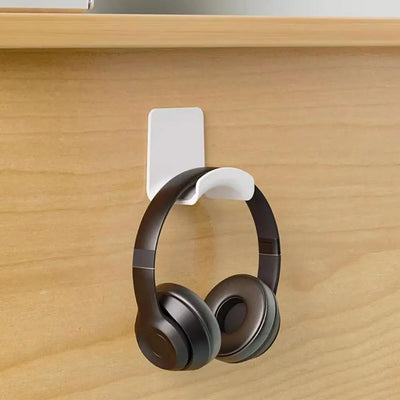 Universal headphone stand adhesive wall mount under desk headset rack holder for gaming earphones.