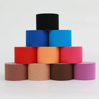 Colorful rolls of 5-10 cm sports kinesio tape for muscle pain relief and athletic recovery.