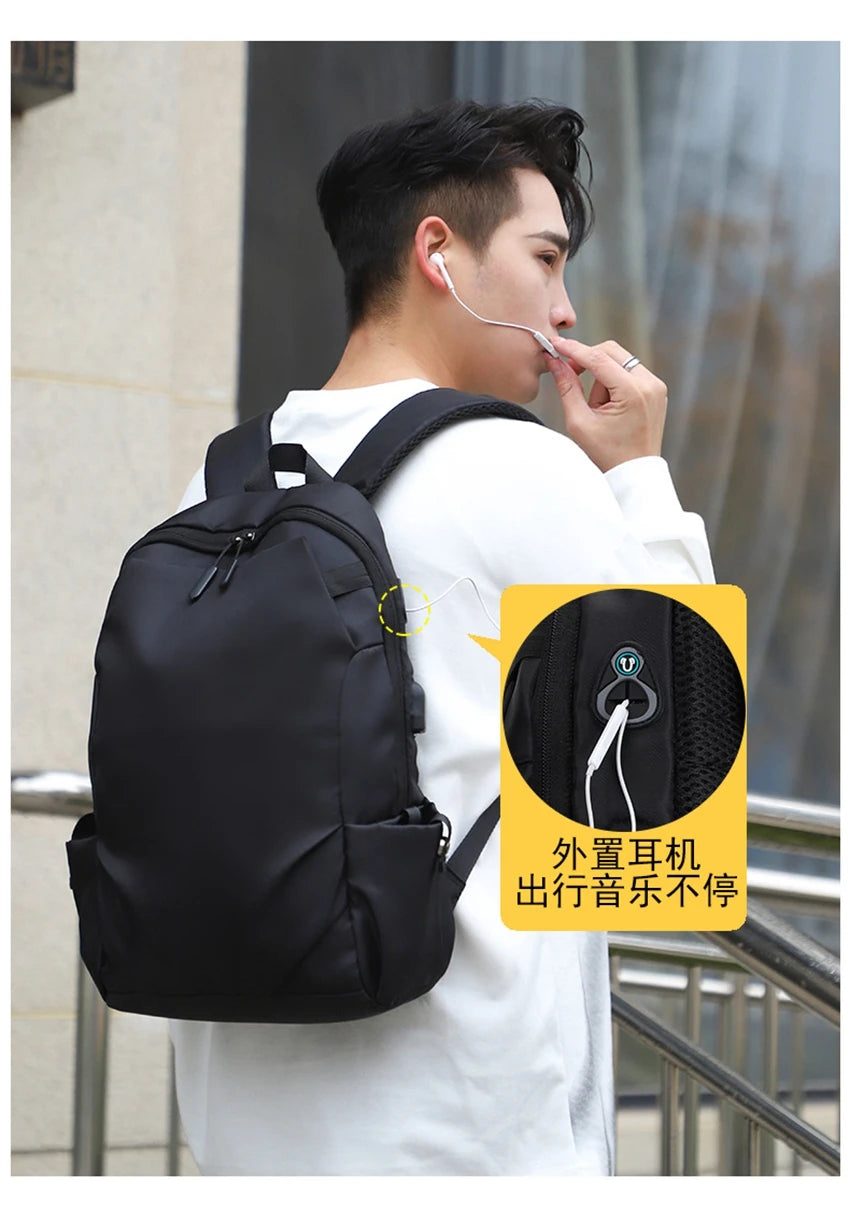 Stylish black unisex backpack with USB port, perfect for college students and teens, showcasing modern design and functionality.