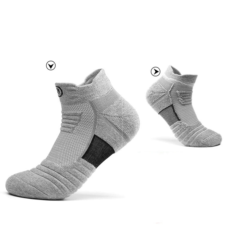 Elastic compression sports socks in grey, designed for breathability and comfort during basketball activities.