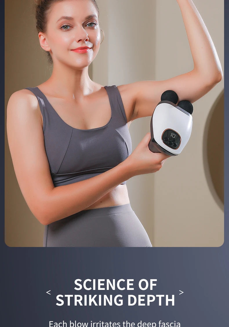 Woman using a double headed massage gun on her arm, demonstrating deep tissue massage for relaxation.