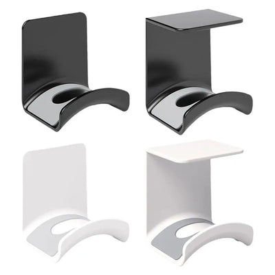 Universal headphone stand adhesive plastic wall mount holder in black and white for under desk organization.