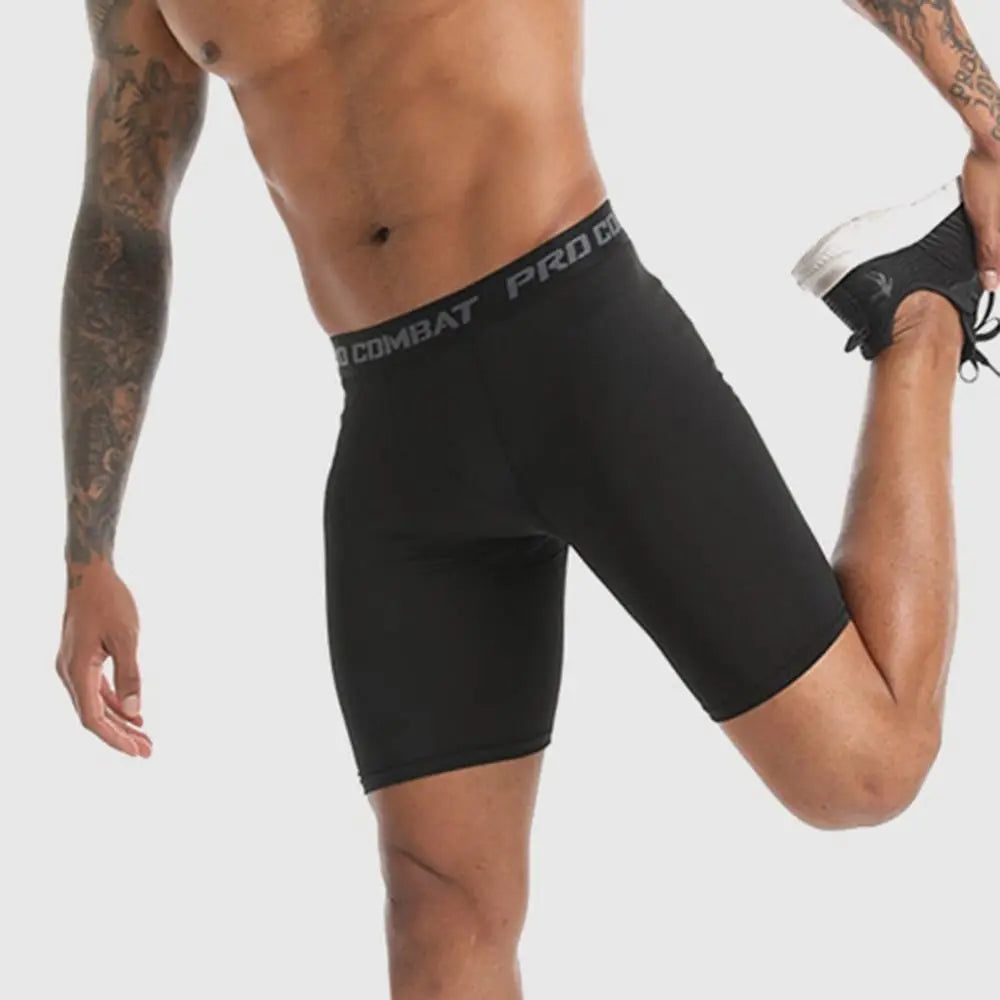 Men's compression shorts for athletic performance, black, worn during workouts and sports activities.