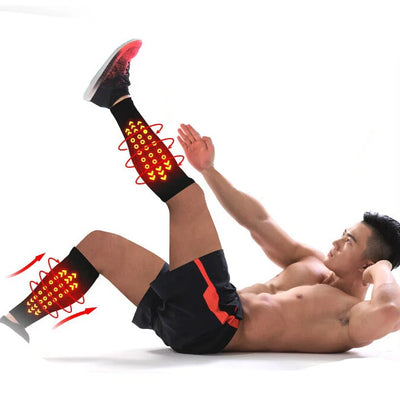 Man demonstrating compression sleeves for leg support, showcasing exercise and recovery benefits.