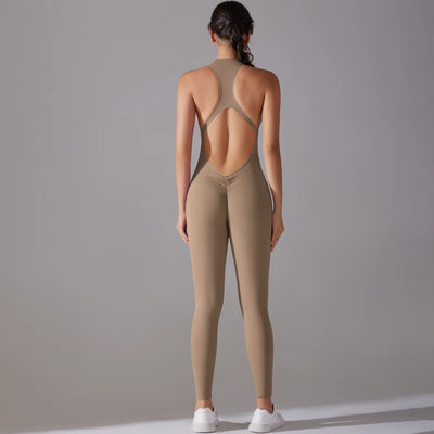 Back view of a women's nude bodysuit featuring tummy control and butt lifting design, ideal for yoga and workouts.