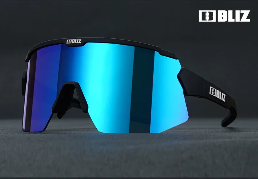 BLIZ Breeze polarized cycling glasses with blue mirror lenses, offering UV protection for MTB and road biking.