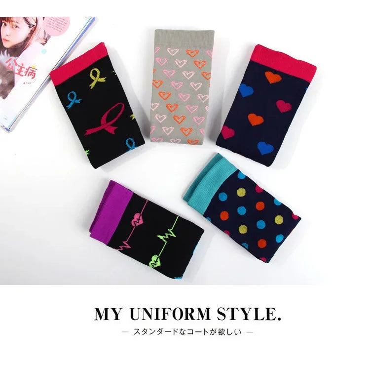 Colorful variety of fun patterned socks on display with hearts, ribbons, and polka dots, ideal for stylish uniform wear.