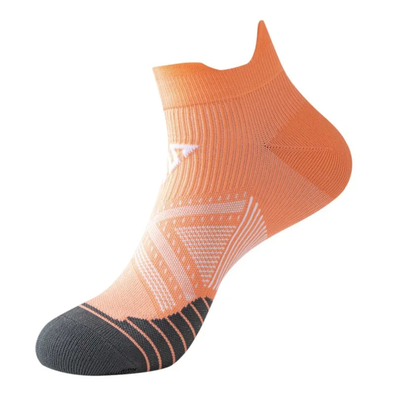 Breathable orange running socks for men and women, designed for fitness and marathons, featuring quick-dry material.