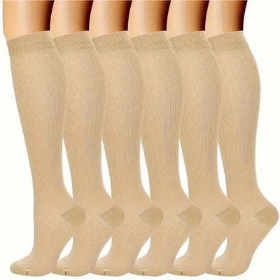 6 pairs of knee-high solid color compression socks in nude, designed for women, ideal for nurses and cycling.