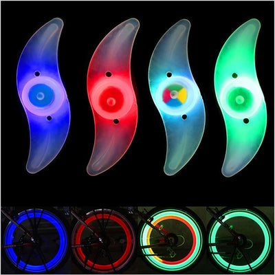 LED bicycle spoke lights in red, blue, and green colors, demonstrating waterproof features and 3 modes for enhanced safety.
