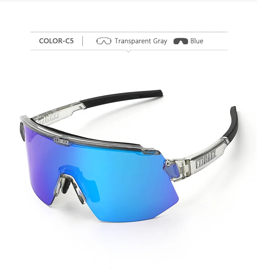 BLIZ Breeze polarized cycling glasses with blue lenses and transparent gray frame for UV protection and optimal visibility.