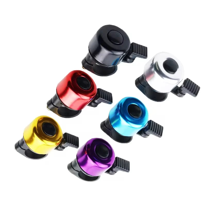 Colorful aluminum alloy MTB bicycle bells in black, red, silver, gold, blue, and purple on a white background.